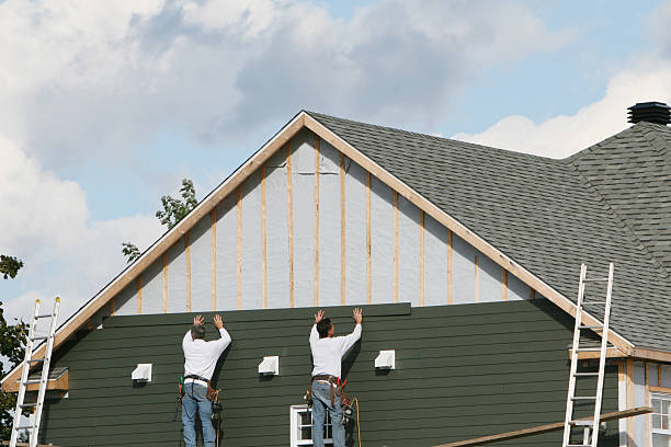 Professional Siding Installation technician working in Jeannette, PA